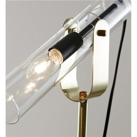 Lampa podłogowa Winston mosiądz klosz szklana bezbarwna tuba produkt szwedzki projektant Joakim Thedin