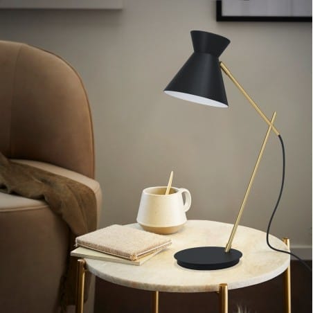 Metalowa lampa stołowa Amezaga połączenie czerni z mosiądzem do sypialni